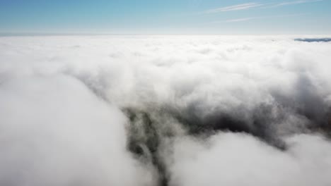 mist fog clouds from above aerial view over