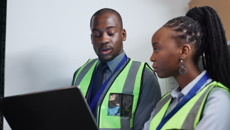 technician, laptop or people in server room
