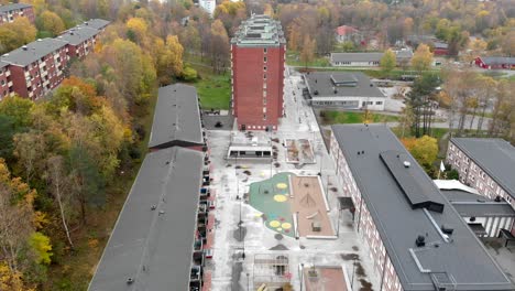 aerial pullback revealing peaceful residential buildings outside gothenburg, sweden