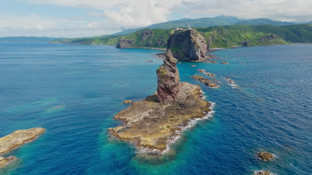 Aerial establisher fly at marine sanctuary of Japanese Sea in Shakotan Hokkaido, famous stone islands in summer