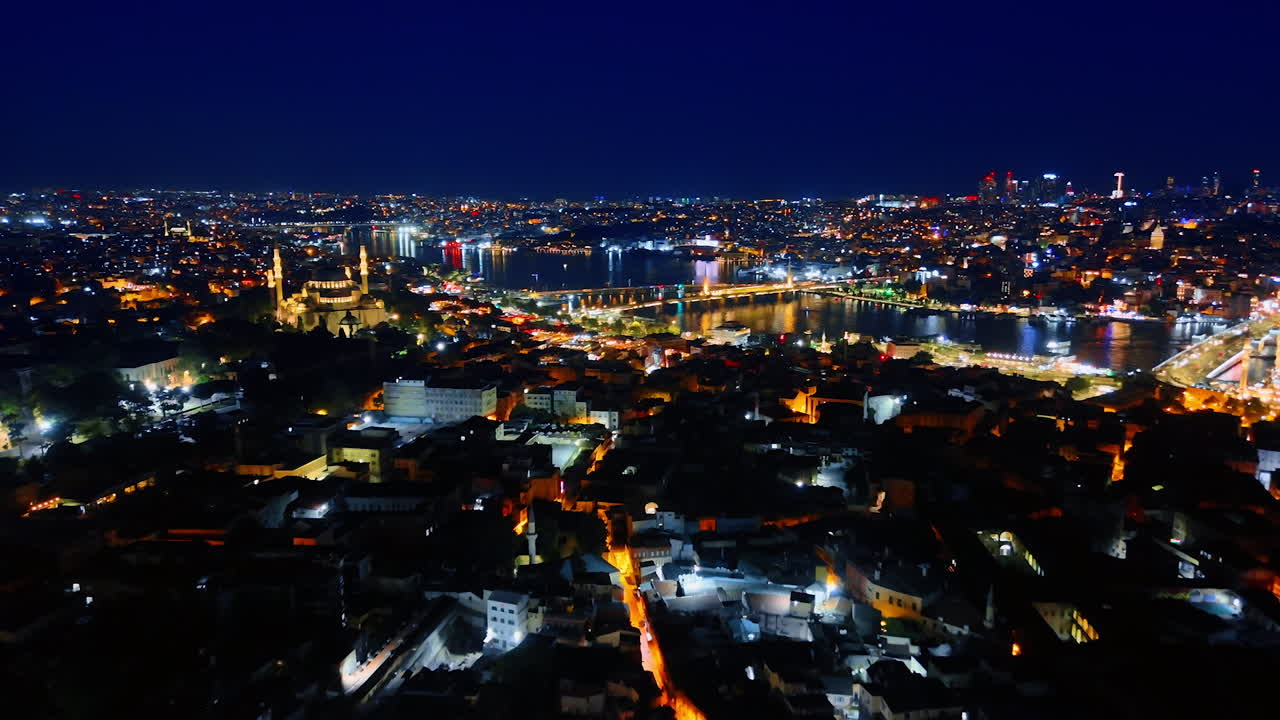 Vast cityscape of stunning Kemer in Turkey at night. Sparkling resort city from aerial perspective