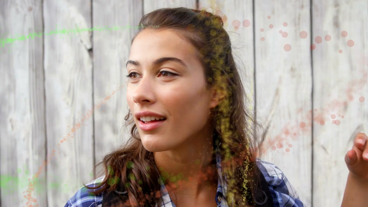 Camera panning student pivoting shading eyes scanning right green orange streaks over student ads