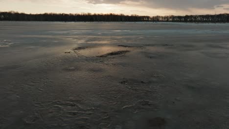 Expanse Frozen Sea At Sunset Of Notsuke Peninsula In Hokkaido, Japan. Aerial Drone Shot