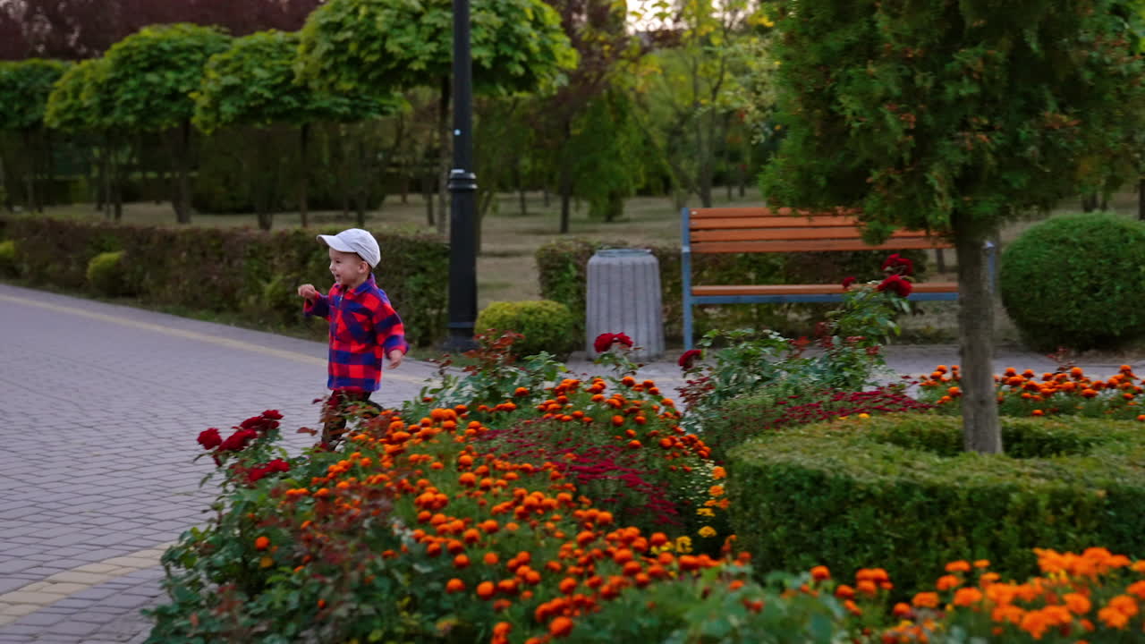Small boy having fun in city park. Child lifestyle on playground.