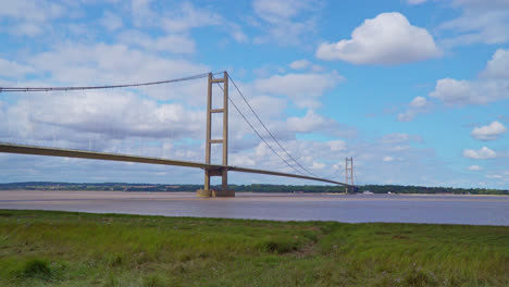 Aerial-drone-view:-Humber-Bridge,-river,-traffic,-Lincolnshire-to-Humberside