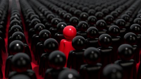 red individual in a crowd of black people