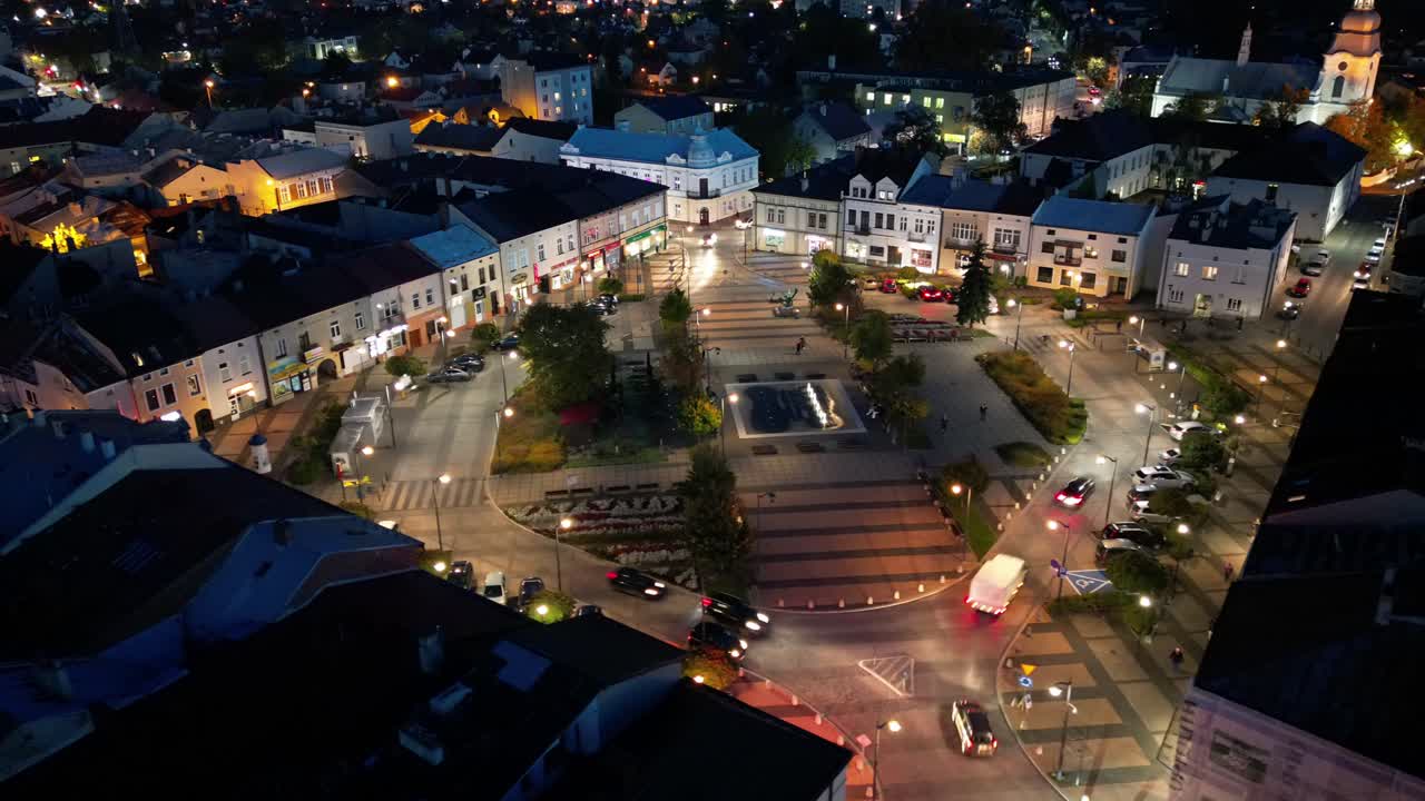 Mesmerizing hyperlapse of the Old Town Market Square in Mielec, Poland, at night.