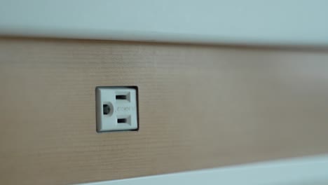 Electrical-Outlet-At-Airport-Desk