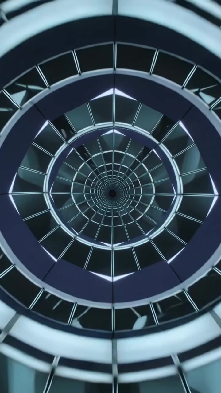 Video verticale: Tubo rotante ad anelli concentrici che pulsa verso l'interno creando profondità per fotogramma, visualizzazione della giunzione.