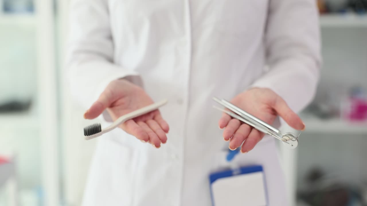 Dental Professional Presenting Oral Hygiene Tools and Dental Instruments