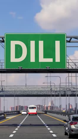 road sign to dili, timor-leste with airplane in the sky