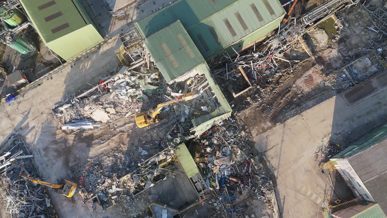 Chemical plant industrial demolition project. Decommissioning and demolition, removal and disposal of asbestos storage equipment, buildings and structural steelwork. Enviromental and global pollution