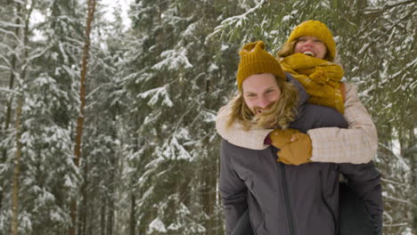 front view of a man in winter forest