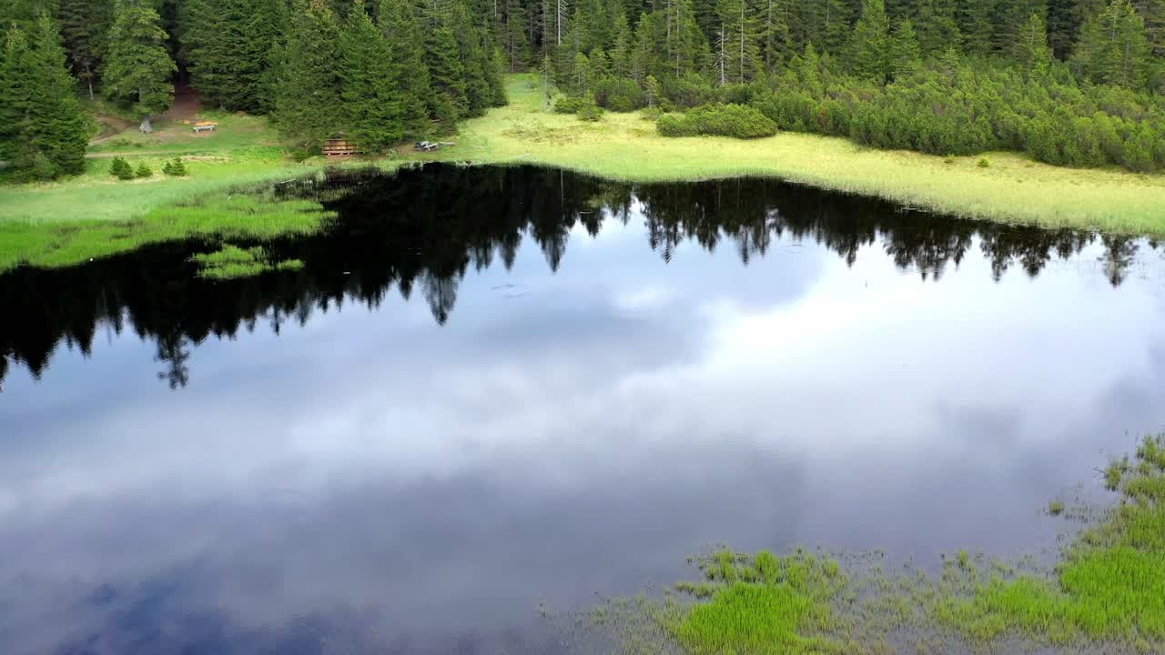 Aerial: Picturesque Black Lake known as part of the Seven Lakes Valley in Triglav National Park in Slovenia
