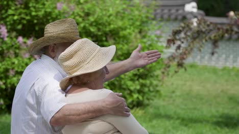 senior couple relaxing in park