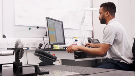 Male Engineer Uses CMM Coordinate Measuring Machine In Factory