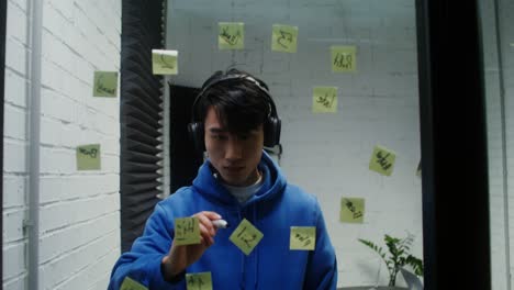 young man in a busy office environment