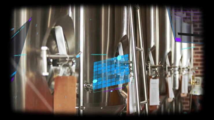 Camera panning right, tanks moving into focus in brewery, HUD centering over manway showing valves