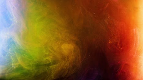 colorful smoky flow of mixed colors in water. stock footage. diffusion of multicolored ink with sequins in water. macro photography of paint flows
