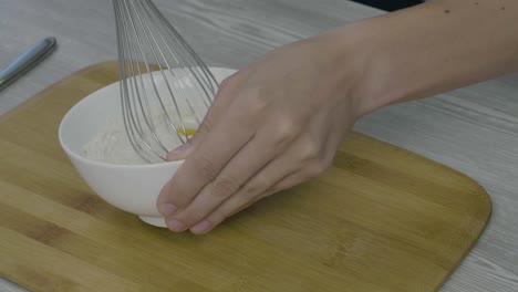 mixing ingredients in a bowl