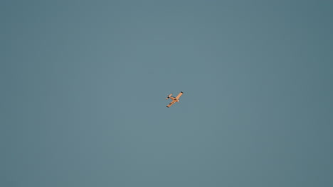 plane against the blue sunset sky - low angle shot