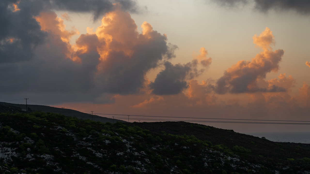 Sunset over hills and coast