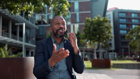 businessman talking on phone outdoors