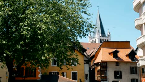 tracking shot from tree to bell tower, annecy france