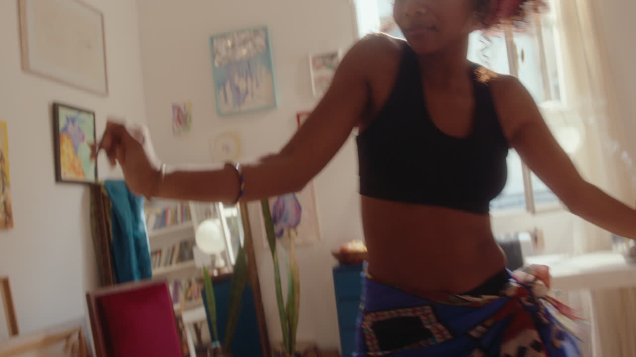 African-American Girl Dancing and Having Fun at Home