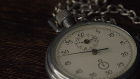 stopwatch on the brown wooden table