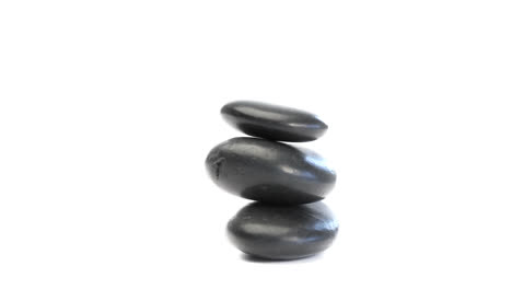 black pebbles rotating