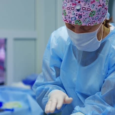 operation on eye in modern surgery. surgeon prepares tampons. ophthalmology operation in modern clinic