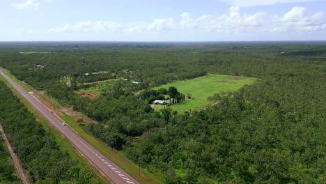 Aerial-drone-of-Rural-Outback-Acreage-Huge-Block-With-House-at-Edge-of-Open-Field,-Panoramic-Aerial-Establish