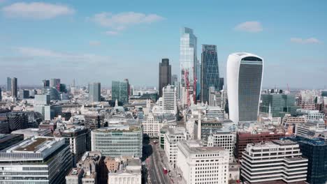 descending drone shot from city of london skyscrapers to london bridge