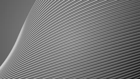 fondo abstracto con cables giratorios cromados. sin problemas de bucle. fondo gris o plateado