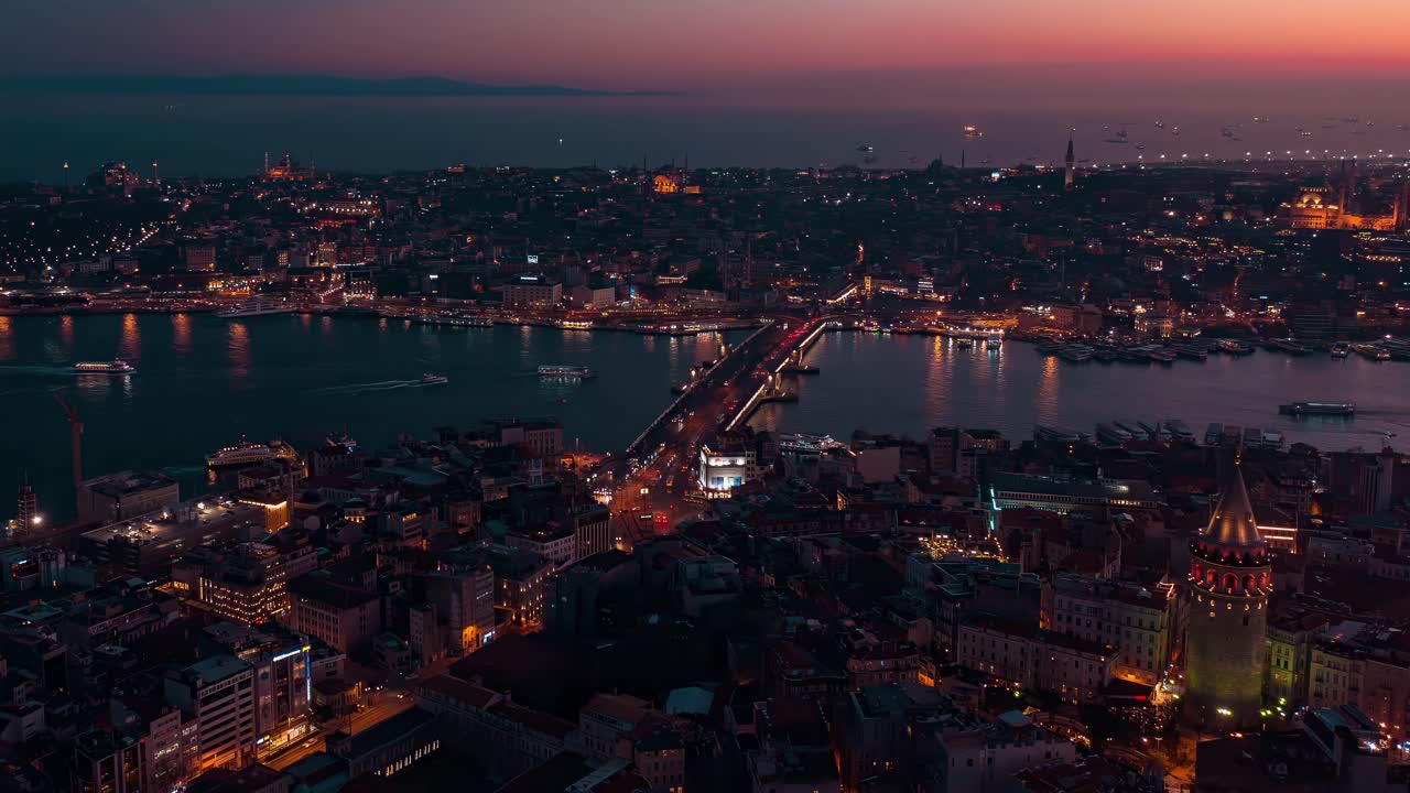 A mesmerizing time-lapse of Istanbul at dusk, capturing the vibrant lights of the city as they come alive and reflect on the waters of the Bosphorus