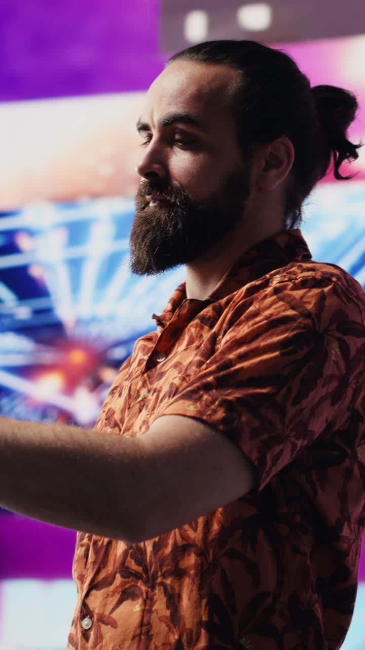 Vertical Video Young male performer feeling carefree with selfies and videos of himself