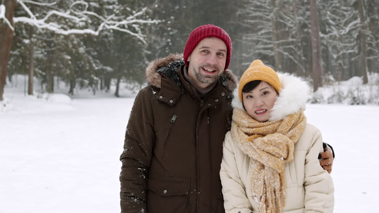 Couple in a snowy park