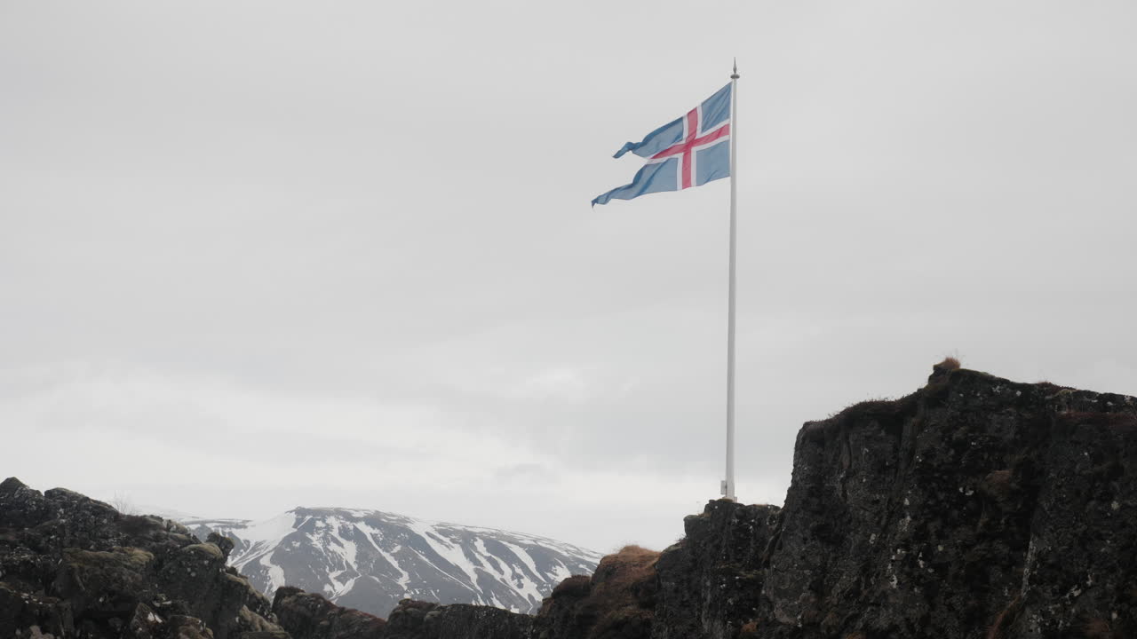 Icelandic Flag on a Mountain Cliff