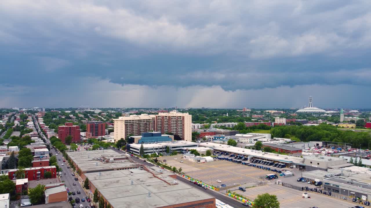 A looming storm clouds over the vibrant city of Montreal, Canada.