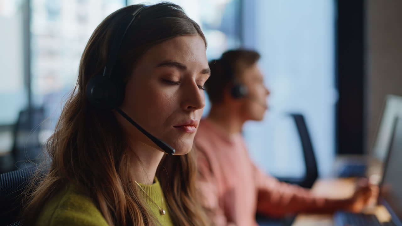Operator hands taking headphones in office closeup. Agent working call center