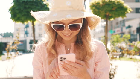 woman using a phone in the city