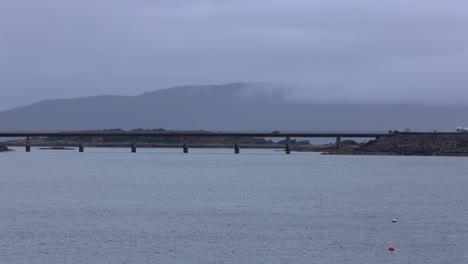 Slow-panning-shot-of-the-Isle-of-Skye-Roadbridge-with-cars-driving