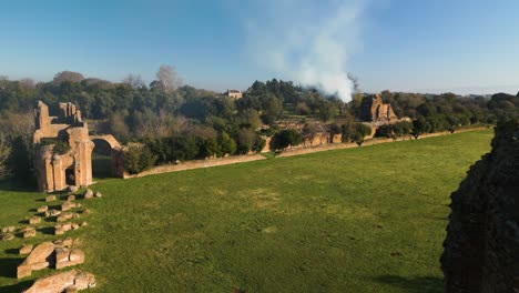 cinematic establishing shot above villa of maxentius along via appia, rome italy