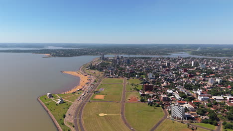 aerial view of beach coastal city playa san jose on paraná river in encarnacion paraguay