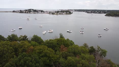 a view of boats in an inlet near hull massachusetts and world's end