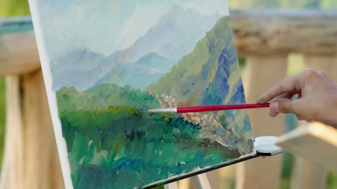 Artist Painting a Mountain Landscape