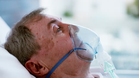 Oxygen-mask,-senior-man-and-patient-in-a-hospital