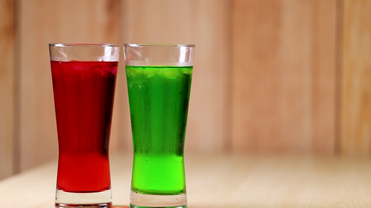 Two glasses clinking in a celebratory toast