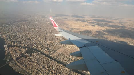 Flight-over-Cairo-city-day-time